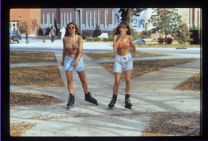 Two students rollerblading